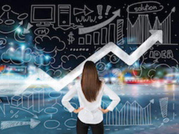 woman looking at graphs