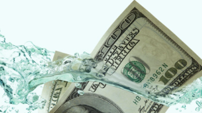 100 dollar bill falling in water