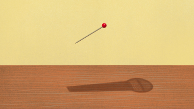 a pin dropping with microphone shadow