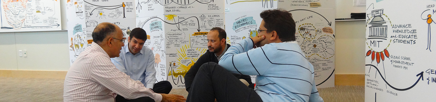 image of MIT faculty teaching in classroom surrounded by scribing