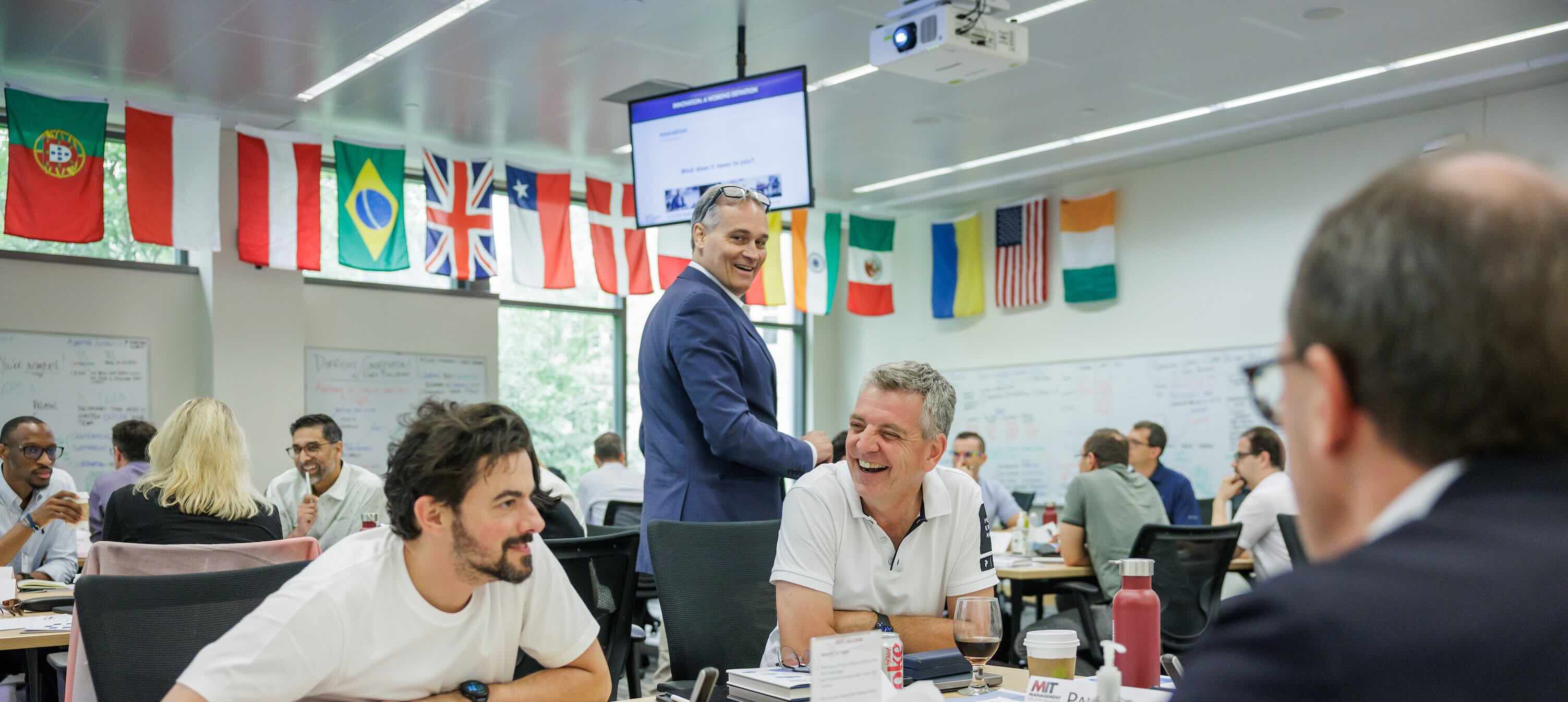 photo of faculty member and participants in a classroom
