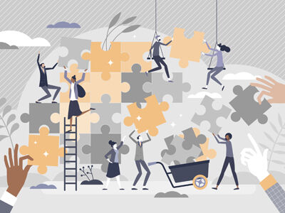 people building a puzzle wall together