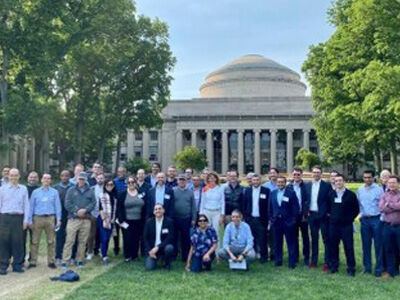 participants in front of MIT dome