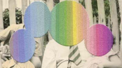 black and white photo of a family with colorful circles covering their faces