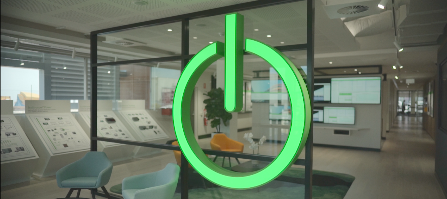 giant neon on/off icon on a glass wall in a building
