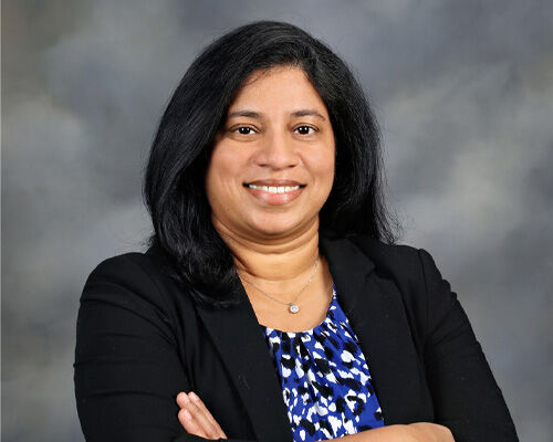 headshot of geetha headshot of geetha