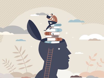 head with books and person reading