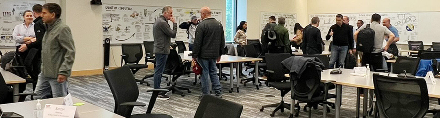 image of MIT participants in classroom surrounded by scribing