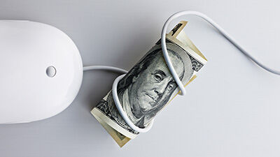 a rolled up stack of bills tied with a wire