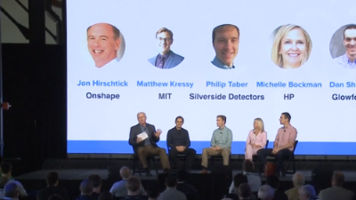 photo of a panel on stage
