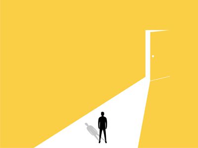 person walking towards door