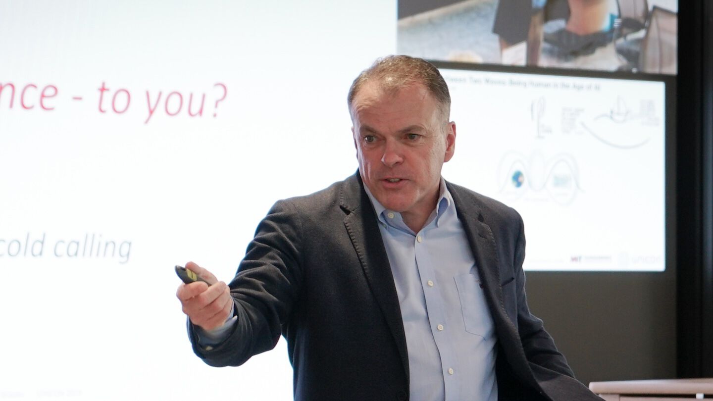 photo of faculty member with a clicker in hand