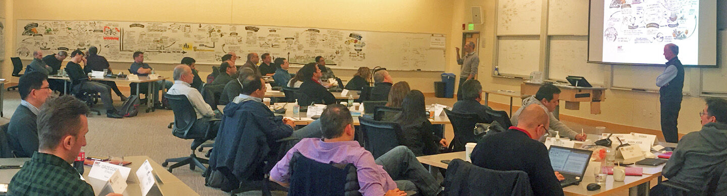 image of MIT faculty teaching in classroom surrounded by scribing
