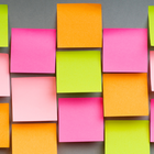 various colored post-it notes on wall