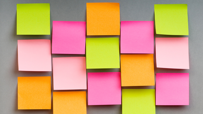 various colored post-it notes on wall image number null
