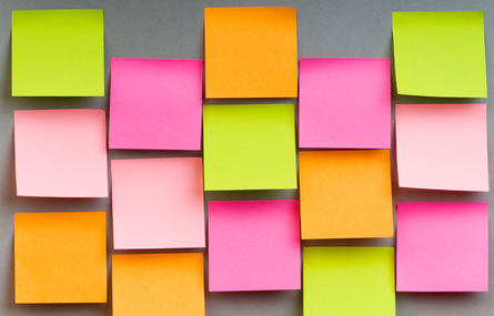 various colored post-it notes on wall