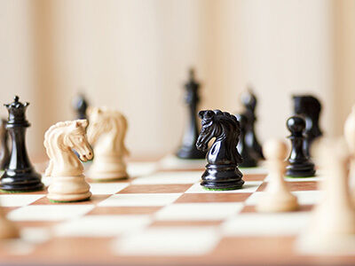 Photograph of chess pieces on a chess board. image number null