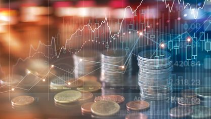 stacks of coins with a digital graph on the top layer image number null