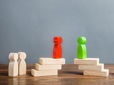 Wooden blocks shaped like people. image number null