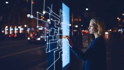 image of a woman touching a virtual board image number null