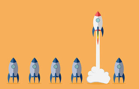 Cartoon image of rocket ship taking off while five others sit on the ground next to it.