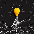 lightbulb depicted as a rocket against a black background