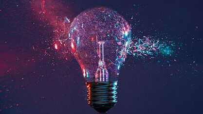 Lightbulb cracking with glass floating off of sides. image number null