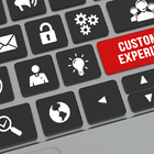 computer keyboard with red customer experience button