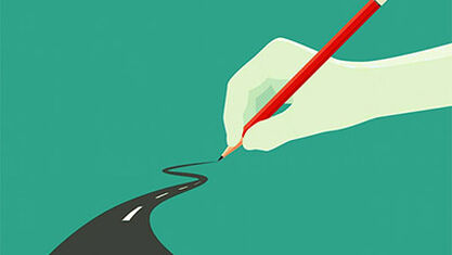 Hand drawing a road with a pencil. image number null