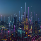 Photograph of a city lit up at night.