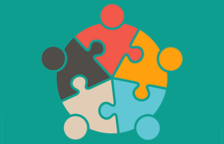 Puzzle pieces fitting together to form a circle.