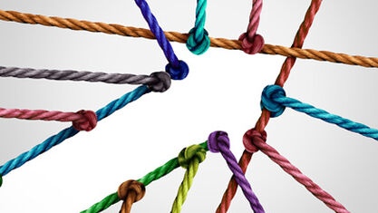 colorful ropes coming together to form an arrow image number null
