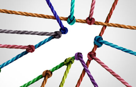 colorful ropes coming together to form an arrow