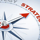 Compass with the word ‘strategy’ representing north.