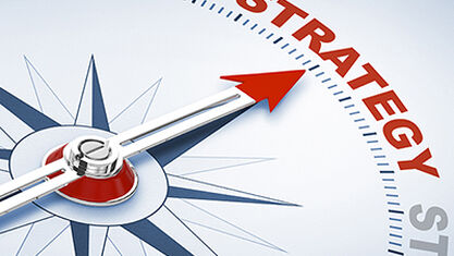Compass with the word ‘strategy’ representing north. image number null