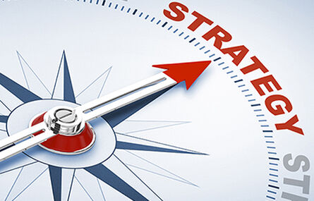 Compass with the word &lsquo;strategy&rsquo; representing north.