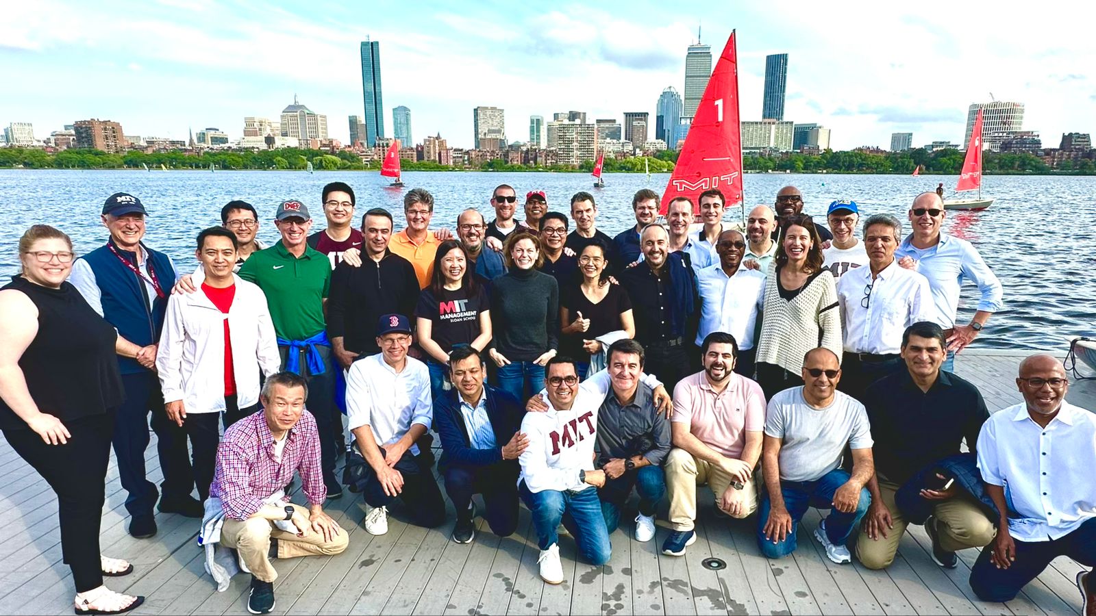 AMP 2023 Cohort Class Picture taken on the Charles River