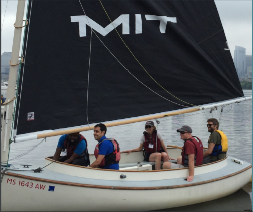  Program alumni on a boat in Boston.