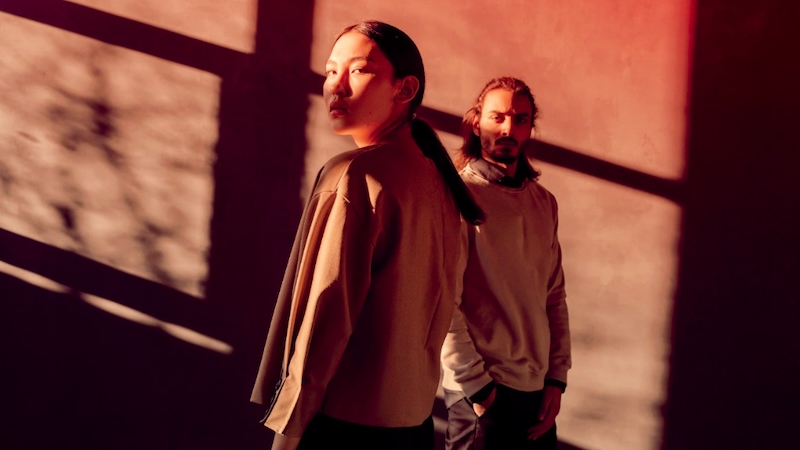 two people looking towards the camera