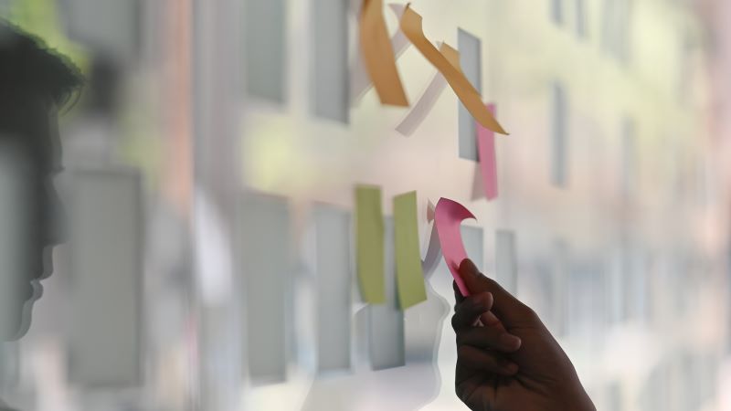 post it notes on a white board